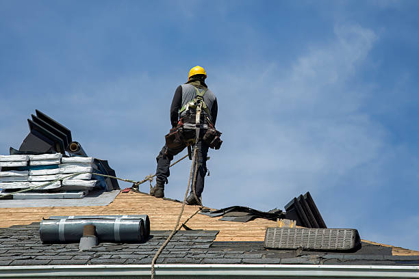 Professional Roofing technician working in Montebello, NY